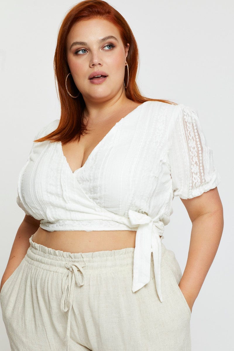 White Peplum Top Lace Flutter Sleeve Wrap Front Tie - Image 3